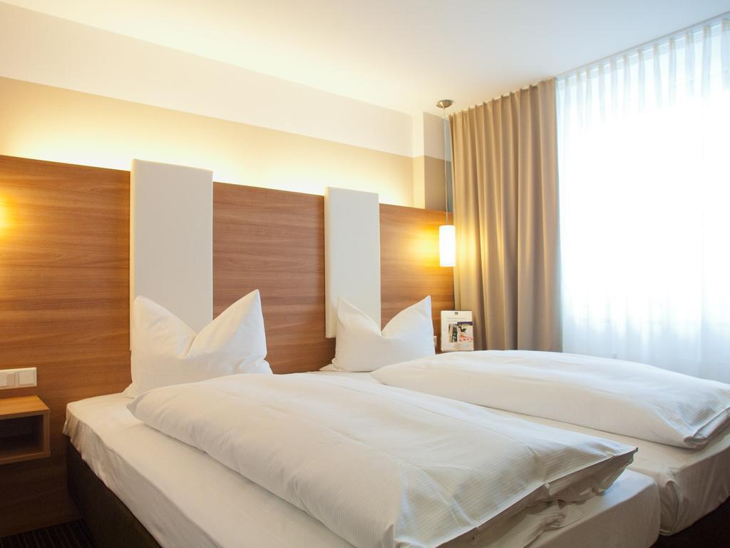 Hotel Central Neu-Isenburg Zimmer foto